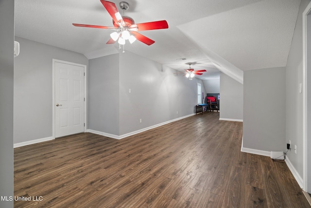 4424 Rebekah Dr, Olive Branch, MS 38654 - bonus room with a ceiling fan, lofted ceiling, dark wood finished floors, and baseboards