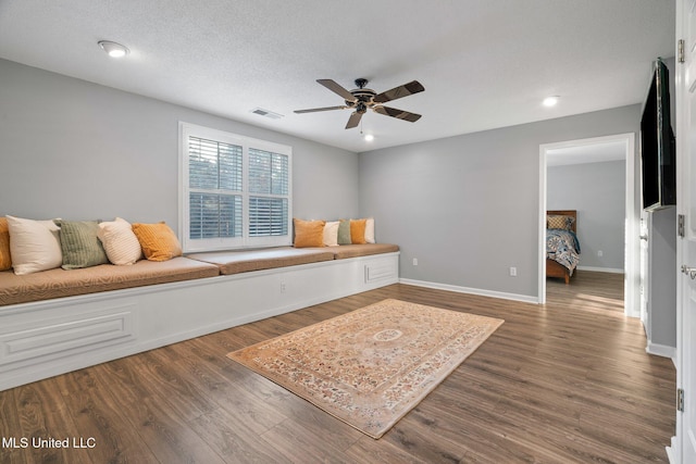 4424 Rebekah Dr, Olive Branch, MS 38654 - living area with ceiling fan, wood finished floors, and baseboards