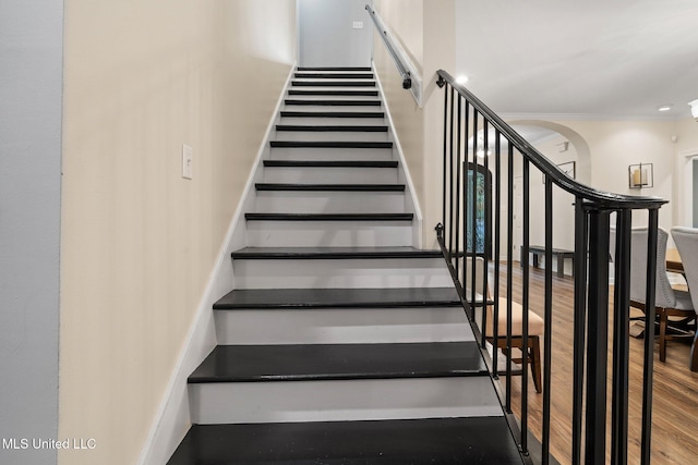 4424 Rebekah Dr, Olive Branch, MS 38654 - stairs with wood finished floors, crown molding, and baseboards