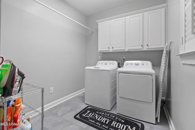 4424 Rebekah Dr, Olive Branch, MS 38654 - laundry room with washer and clothes dryer, cabinet space, and baseboards