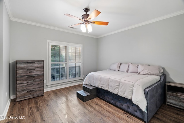 4424 Rebekah Dr, Olive Branch, MS 38654 - bedroom with ornamental molding, wood finished floors, baseboards, and ceiling fan