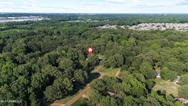 4424 Rebekah Dr, Olive Branch, MS 38654 - aerial view of property's location with a heavily wooded area