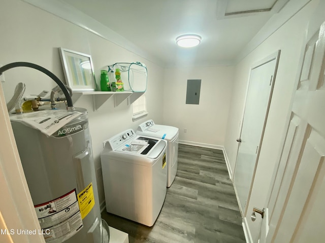 clothes washing area featuring hardwood / wood-style flooring, washer and clothes dryer, electric water heater, and electric panel