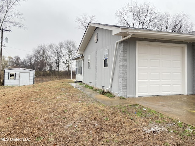 view of home's exterior with a storage unit