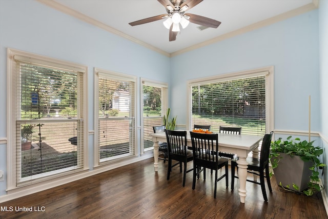 dining area with crown molding, dark wood-type flooring, and ceiling fan