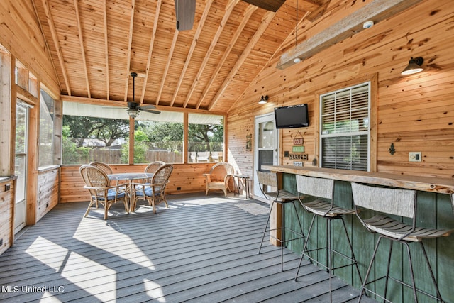 sunroom / solarium featuring a hot tub, wood ceiling, a healthy amount of sunlight, and ceiling fan