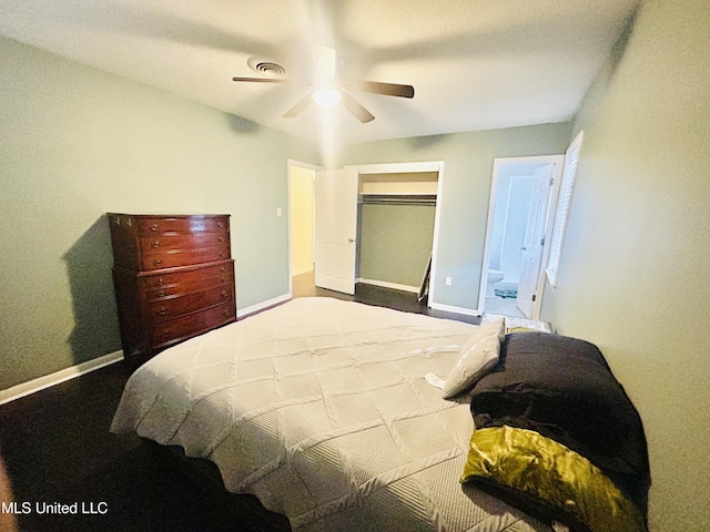 carpeted bedroom featuring ceiling fan and a closet