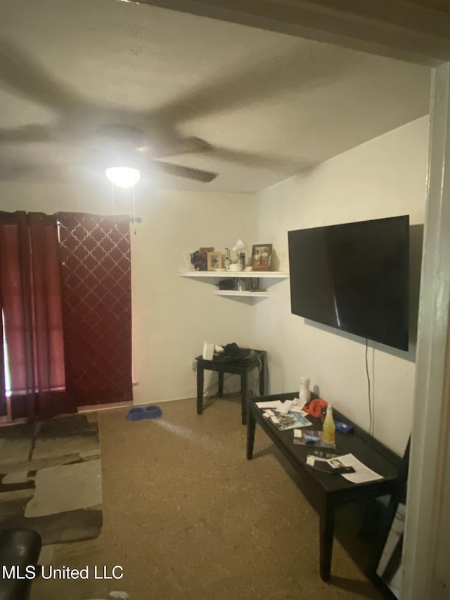 351 E Academy St, Canton, MS 39046 - living room featuring carpet and ceiling fan