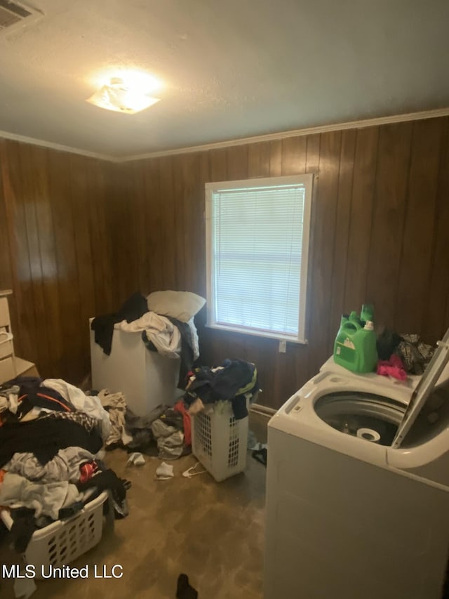 351 E Academy St, Canton, MS 39046 - bedroom featuring wooden walls and washer / clothes dryer