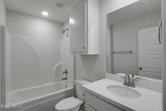 full bathroom with toilet, vanity, and tub / shower combination