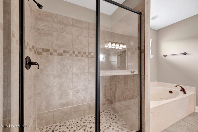 2338 Khushboo Cv, Southaven, MS 38671 - bathroom with a shower stall and a garden tub