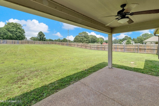 2338 Khushboo Cv, Southaven, MS 38671 - fenced backyard with ceiling fan and a patio