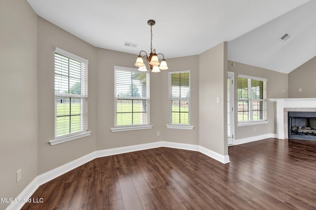 2338 Khushboo Cv, Southaven, MS 38671 - unfurnished dining area featuring a chandelier, dark wood-style flooring, and plenty of natural light