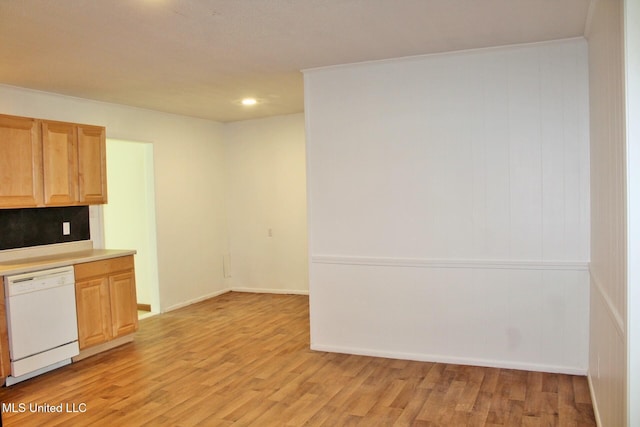 kitchen with dishwasher, light countertops, recessed lighting, decorative backsplash, and light wood-type flooring