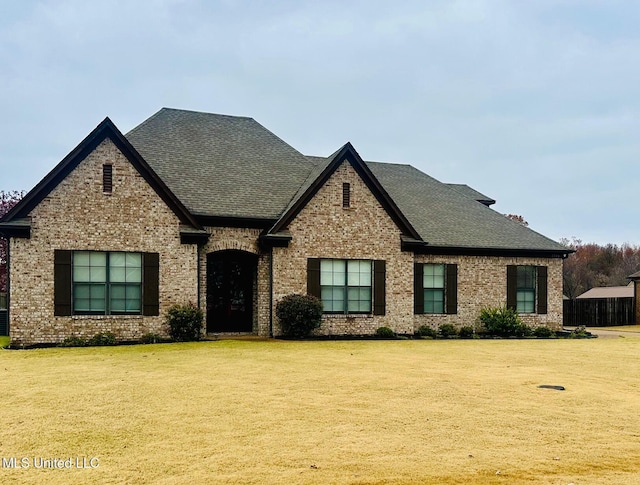 view of front of home with a front yard