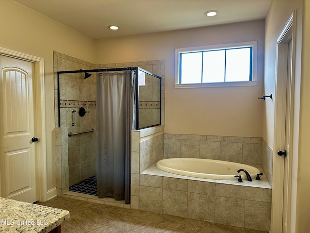 bathroom featuring tile patterned floors, vanity, and independent shower and bath