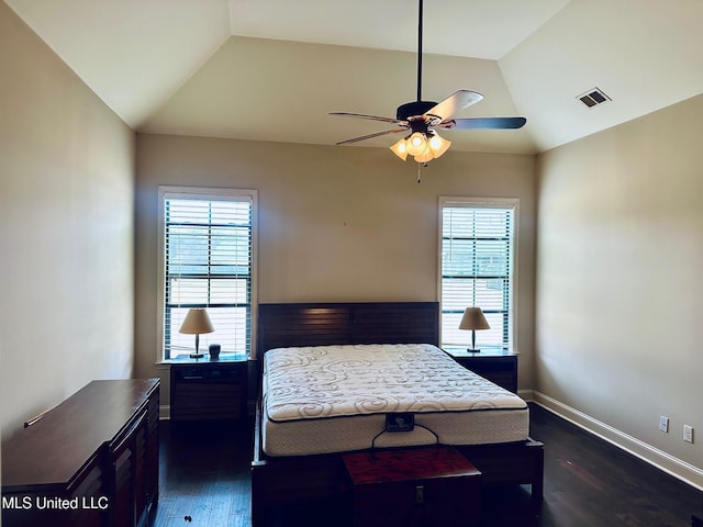 bedroom featuring vaulted ceiling, ceiling fan, and dark hardwood / wood-style flooring