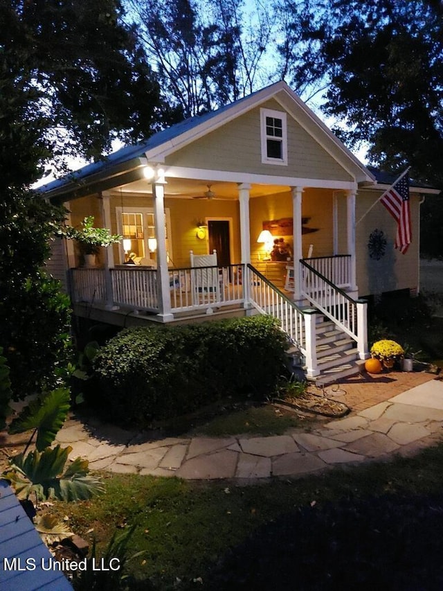 view of front of property with a porch and a ceiling fan