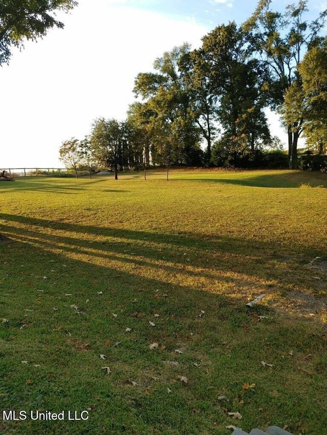 view of community featuring a lawn