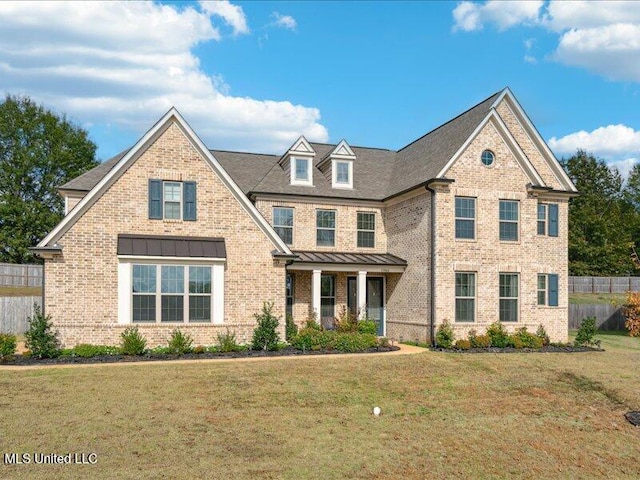 view of front of home featuring a front lawn