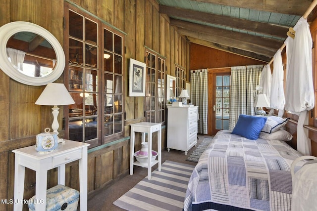 6131 Jenness Rd, Pearlington, MS 39572 - bedroom featuring wooden walls and dark colored carpet