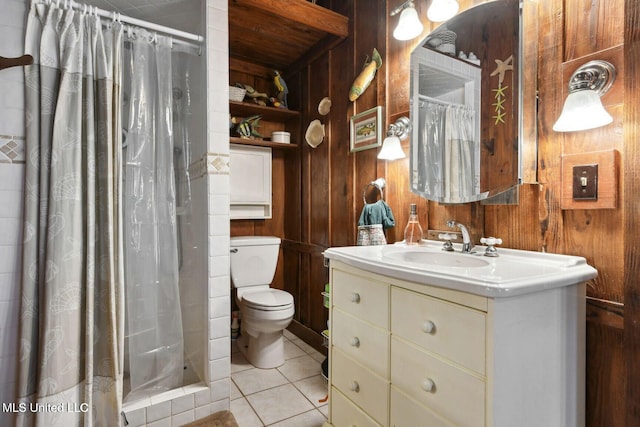 6131 Jenness Rd, Pearlington, MS 39572 - bathroom with wooden walls, tile patterned flooring, toilet, curtained shower, and vanity