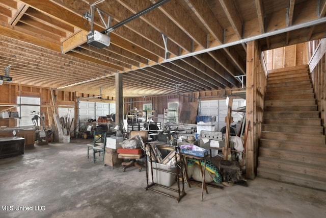 6131 Jenness Rd, Pearlington, MS 39572 - misc room featuring healthy amount of natural light, concrete floors, and a garage