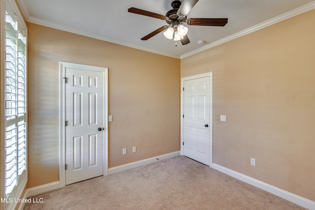 unfurnished bedroom with light carpet, ceiling fan, and ornamental molding