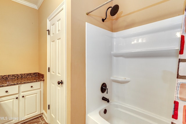 bathroom with shower / bath combination with curtain, vanity, and crown molding