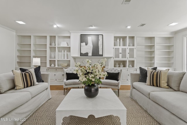 13 Highland Meadows Dr, Jackson, MS 39211 - living area with wood finished floors, ornamental molding, recessed lighting, and built in features