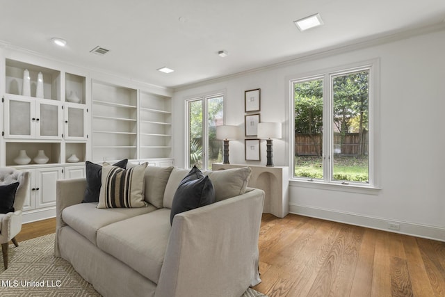 13 Highland Meadows Dr, Jackson, MS 39211 - living area with crown molding and wood finished floors