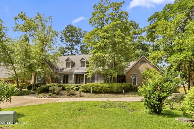 13 Highland Meadows Dr, Jackson, MS 39211 - new england style home with a front yard