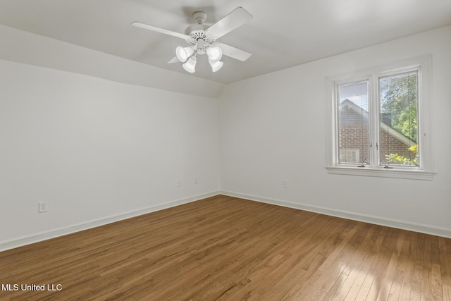 13 Highland Meadows Dr, Jackson, MS 39211 - unfurnished room featuring wood finished floors, a ceiling fan, and vaulted ceiling