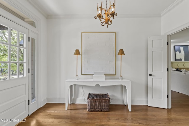 13 Highland Meadows Dr, Jackson, MS 39211 - entryway featuring crown molding, a chandelier, and wood finished floors