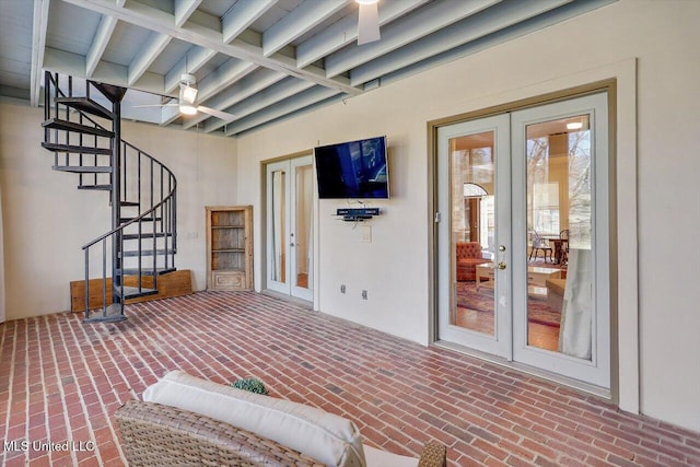 interior space with french doors and stairs