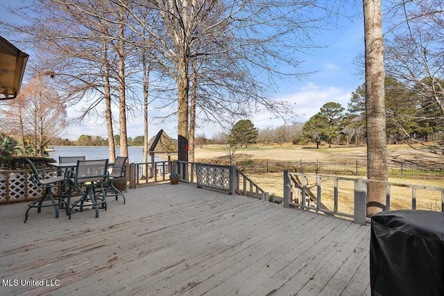 wooden terrace with grilling area