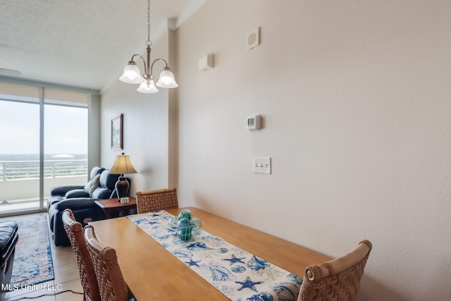 2060 Beach Blvd Unit 1602, Biloxi, MS 39531 - dining area with a wall of windows and a chandelier