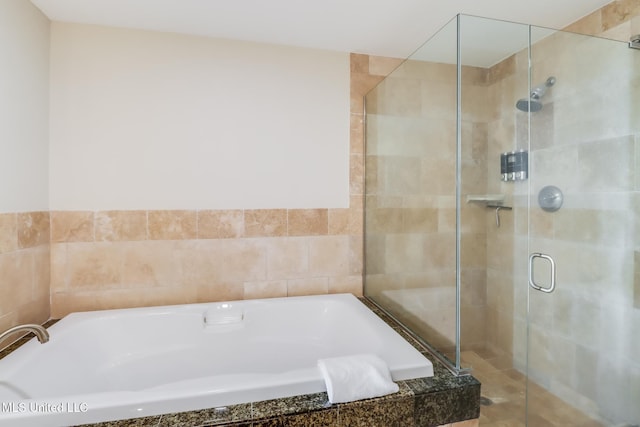 2060 Beach Blvd Unit 1602, Biloxi, MS 39531 - bathroom with a stall shower and a bath