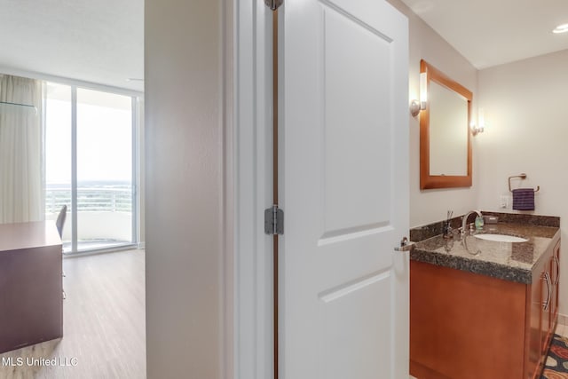 2060 Beach Blvd Unit 1602, Biloxi, MS 39531 - bathroom featuring vanity and wood finished floors