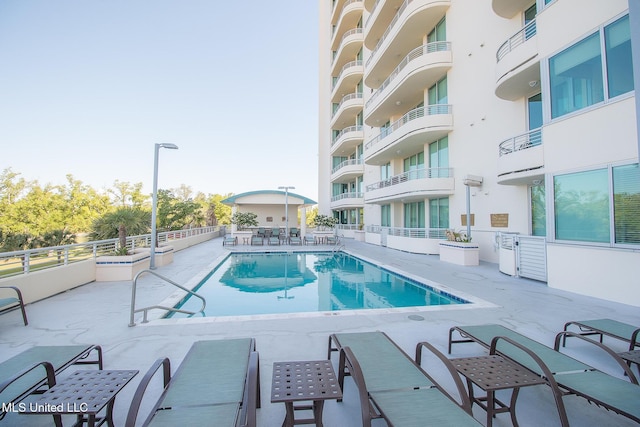 2060 Beach Blvd Unit 1602, Biloxi, MS 39531 - community pool featuring a patio area