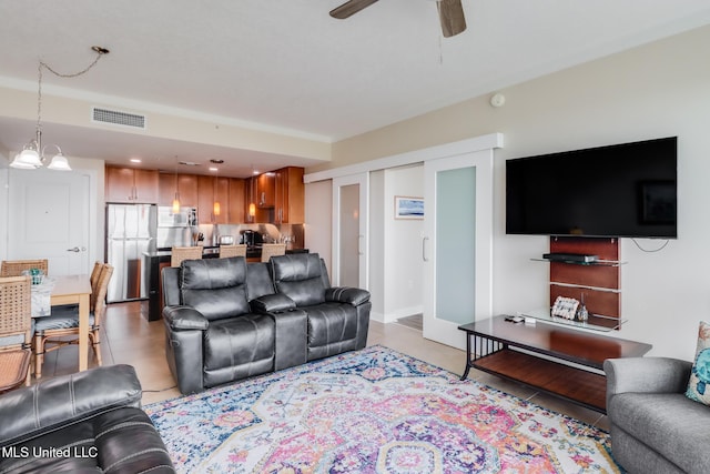 2060 Beach Blvd Unit 1602, Biloxi, MS 39531 - living area featuring light tile patterned flooring and a ceiling fan