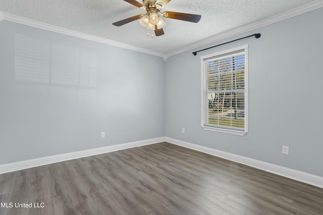 empty room featuring crown molding, baseboards, wood finished floors, a textured ceiling, and a ceiling fan