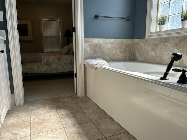 153 Bradfield Rd, Gluckstadt, MS 39110 - bathroom featuring ensuite bath, a bath, and tile patterned flooring