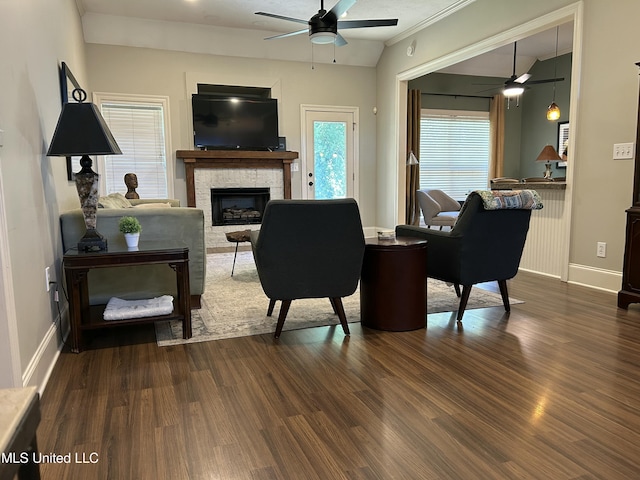 153 Bradfield Rd, Gluckstadt, MS 39110 - living area featuring ceiling fan, a stone fireplace, and dark wood finished floors