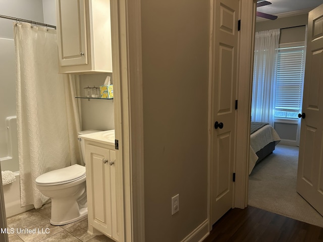 153 Bradfield Rd, Gluckstadt, MS 39110 - full bathroom featuring toilet, vanity, and ornamental molding