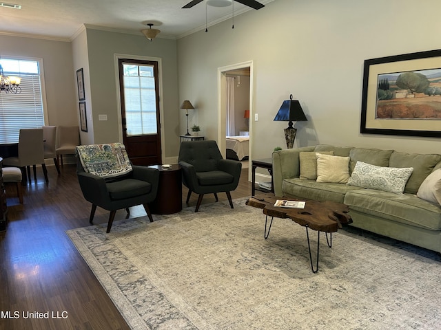 153 Bradfield Rd, Gluckstadt, MS 39110 - living area with wood finished floors, a ceiling fan, ornamental molding, a chandelier, and baseboards