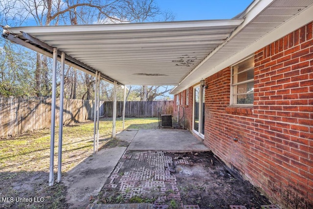 view of patio / terrace featuring a fenced backyard and central AC