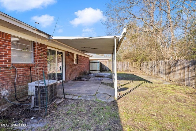 view of patio / terrace featuring a fenced backyard and central AC unit