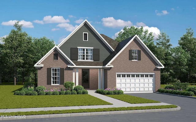 view of front of property featuring a garage and a front lawn