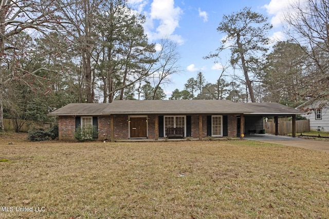 ranch-style home with a front lawn and a carport